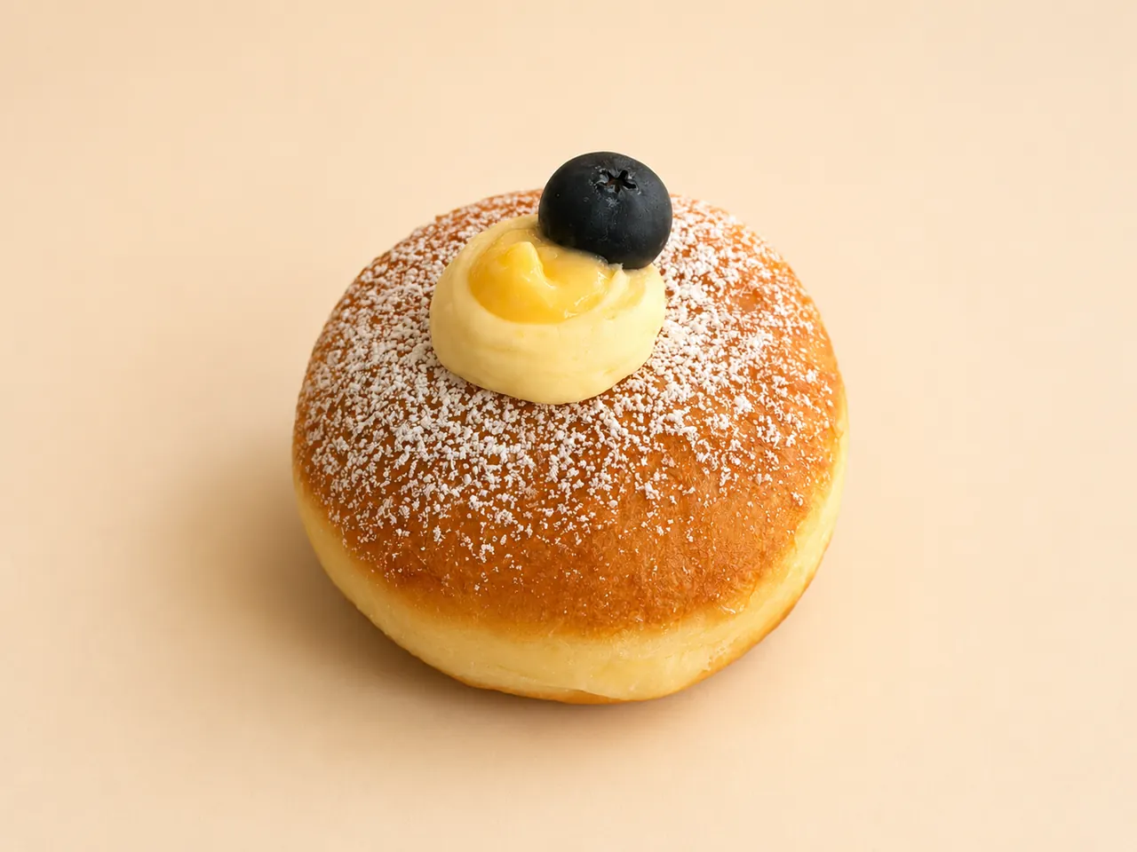 Lemon Messy Bomboloni, silky lemon curd made with real lemons. it gets a little messy.